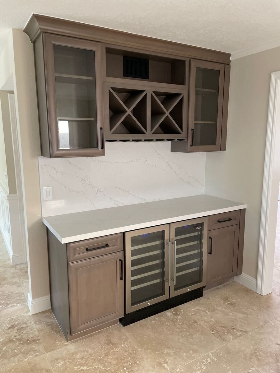 Custom wet bar with wine rack and dual wine fridges