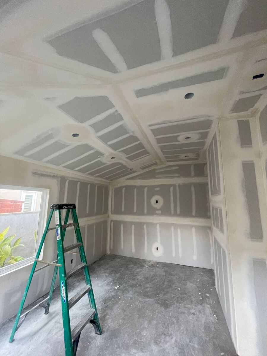 Coffered drywall ceiling with recessed lighting