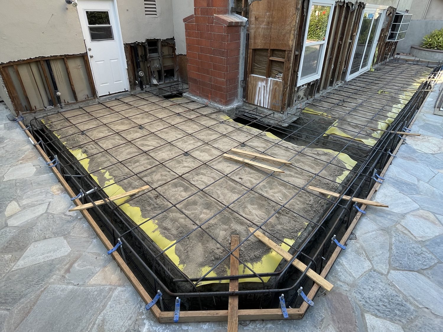Rebar set in the forms for the addition’s footings and slab