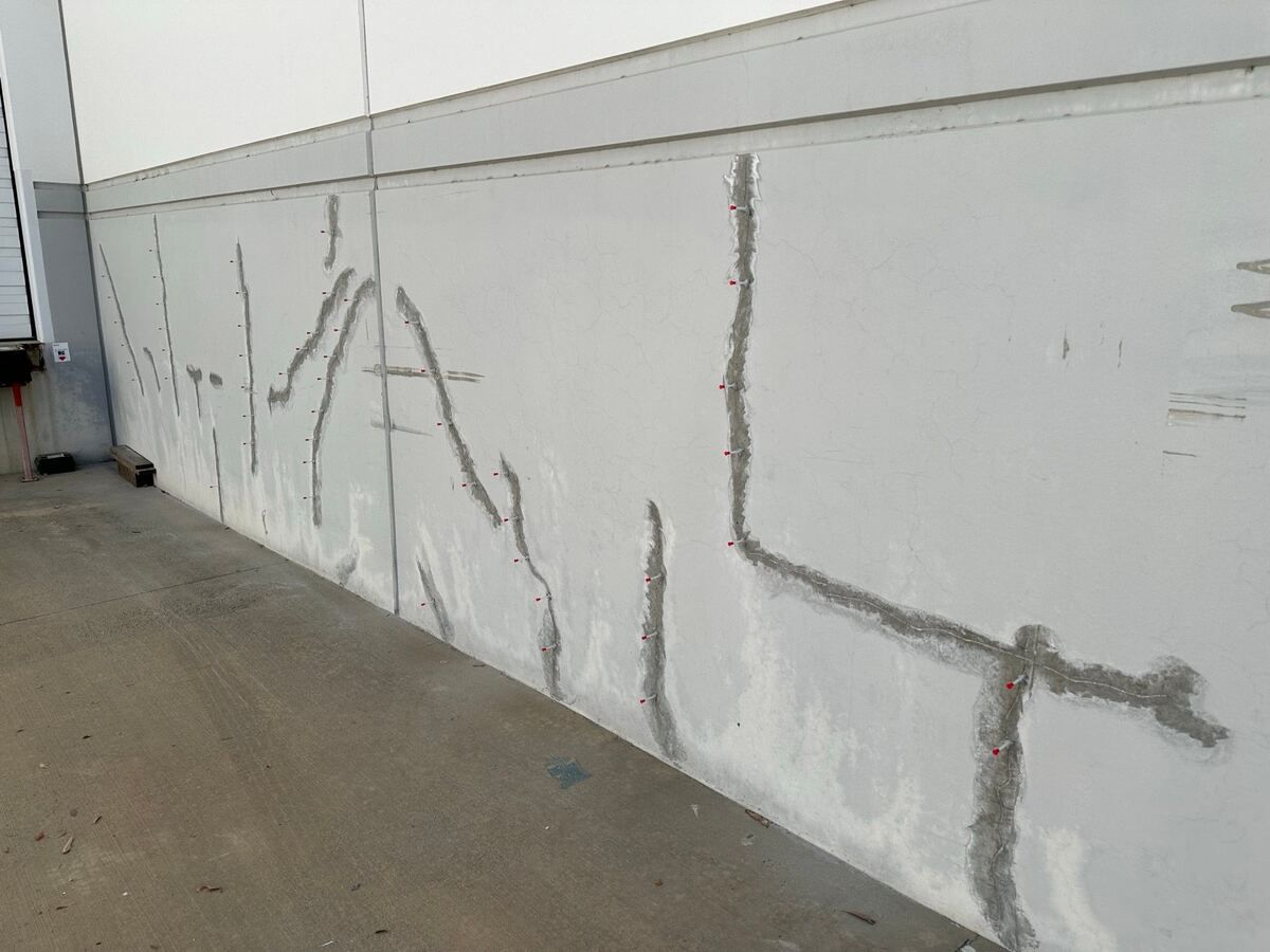 Cracked tilt-up panels routed and flagged for injection