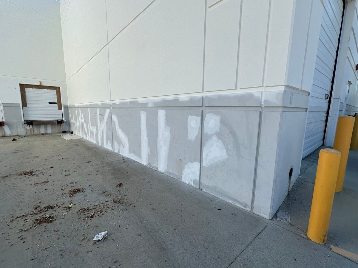 Tilt-up wall with cracks filled and sealed