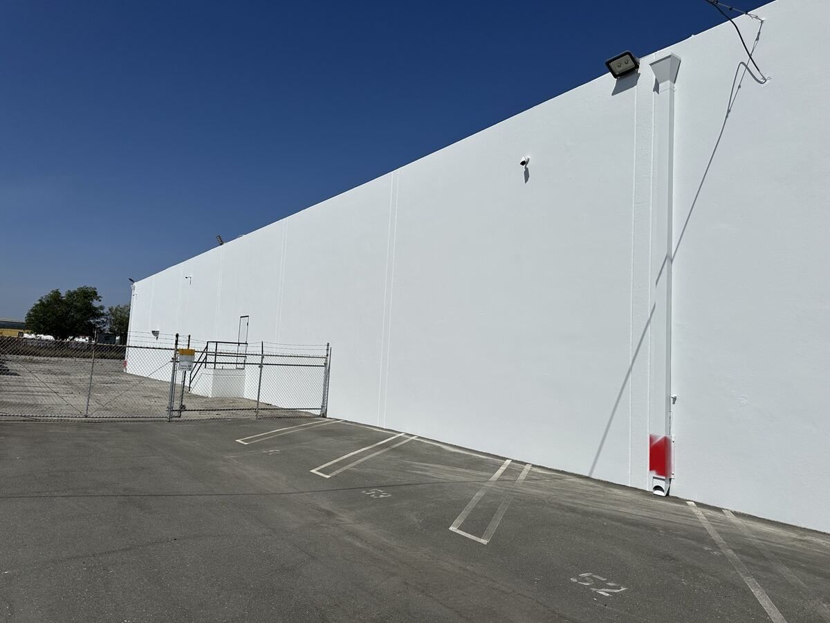 Repaired and sealed tilt-up wall