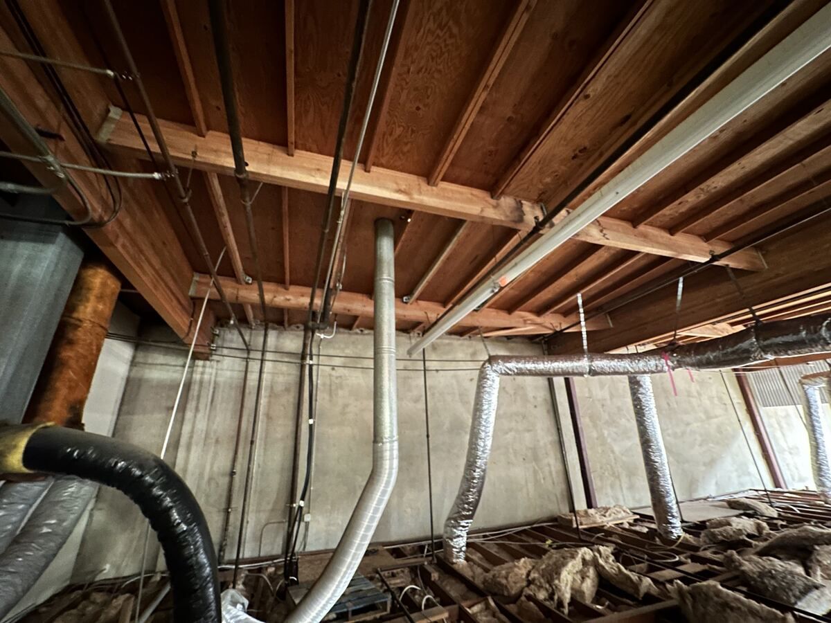 Structural roof framing and beams at Statek Corporation in Orange, California