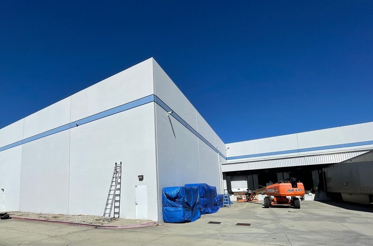 Refinished and sealed tilt-up building elevation