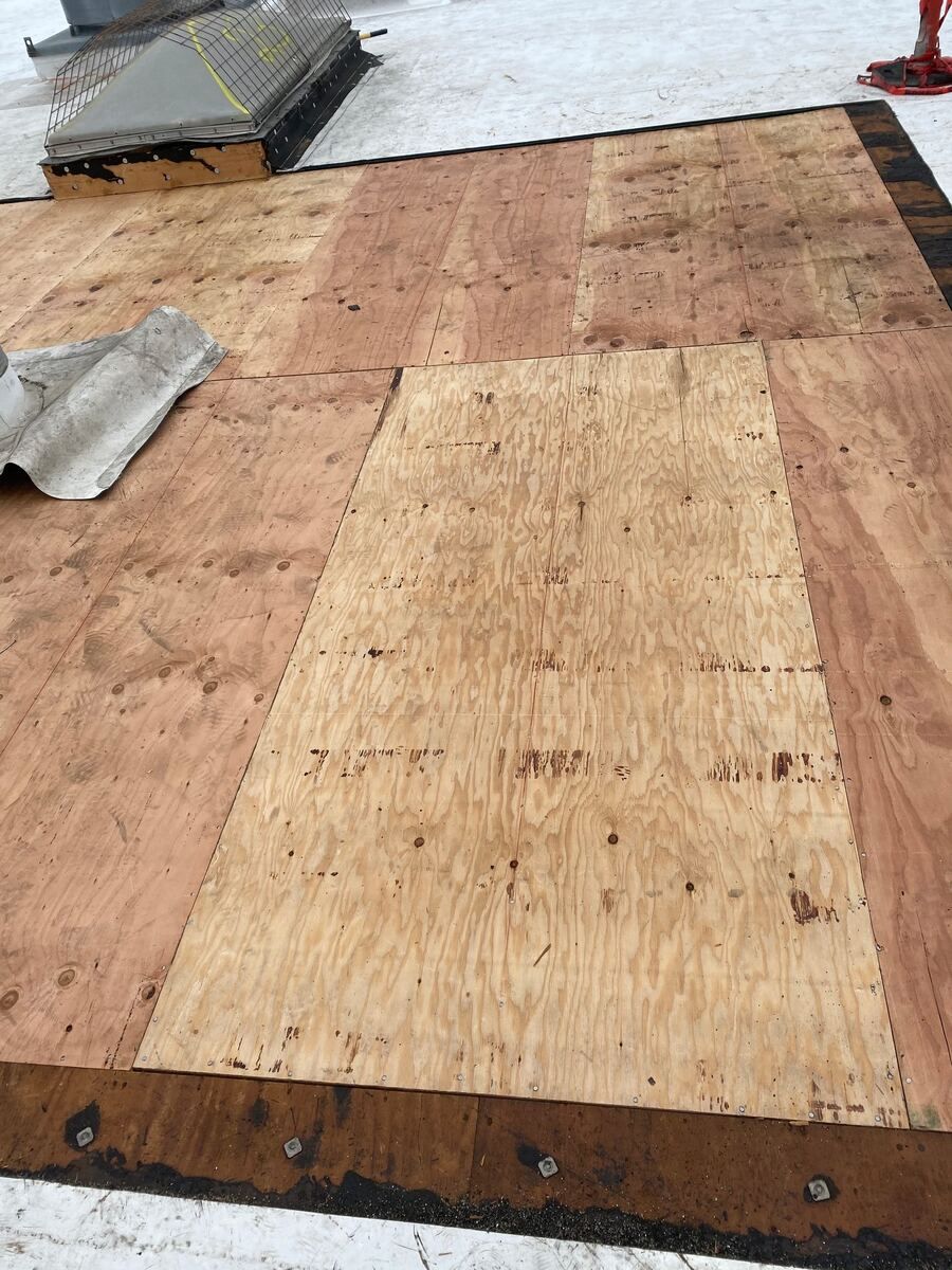 Panelized roof repair, sub-purlin and plywood re-decking, at a Valvoline property